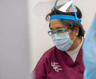 Chicago dental team member wearing personal protective equipment