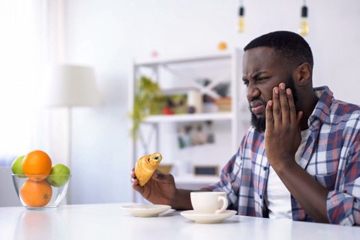 Man with a painful tooth