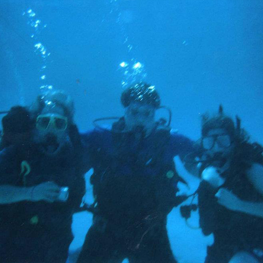 Doctor David and two other people scuba diving