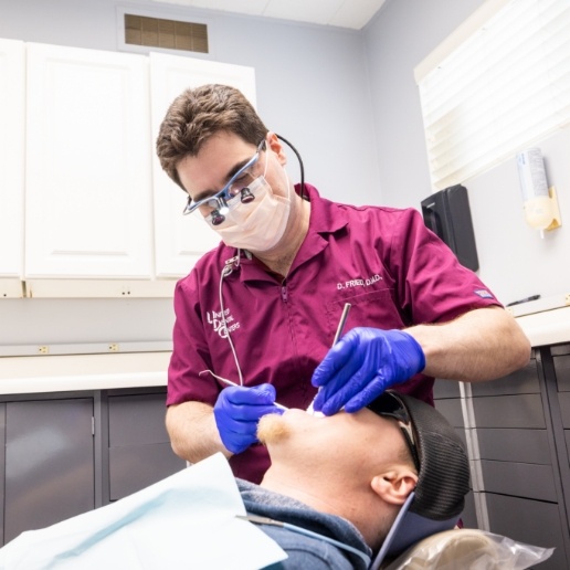 Doctor David Fried performing dental exam for preventive dentistry in Chicago