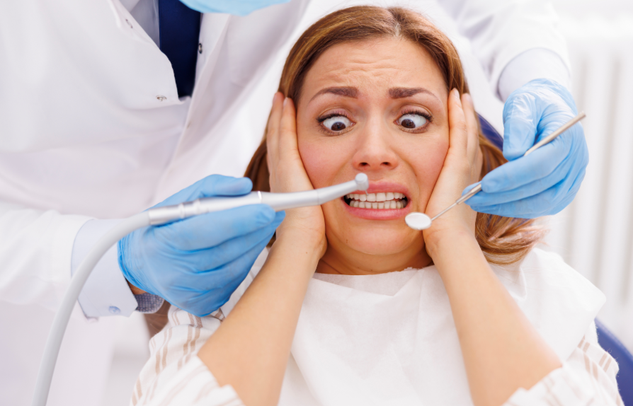 Patient looking scared at dentist